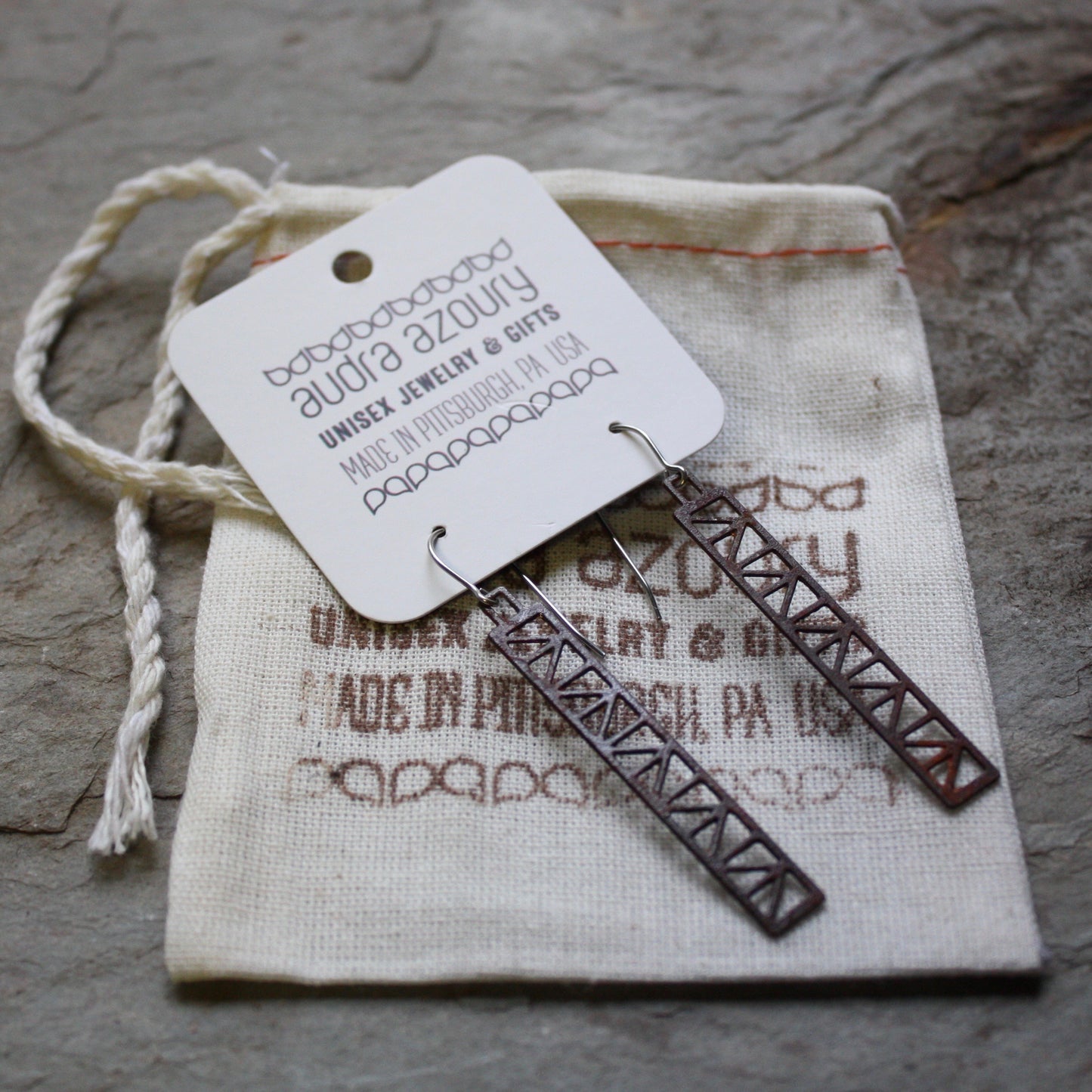 Peace Truss Earring design by Audra Azoury