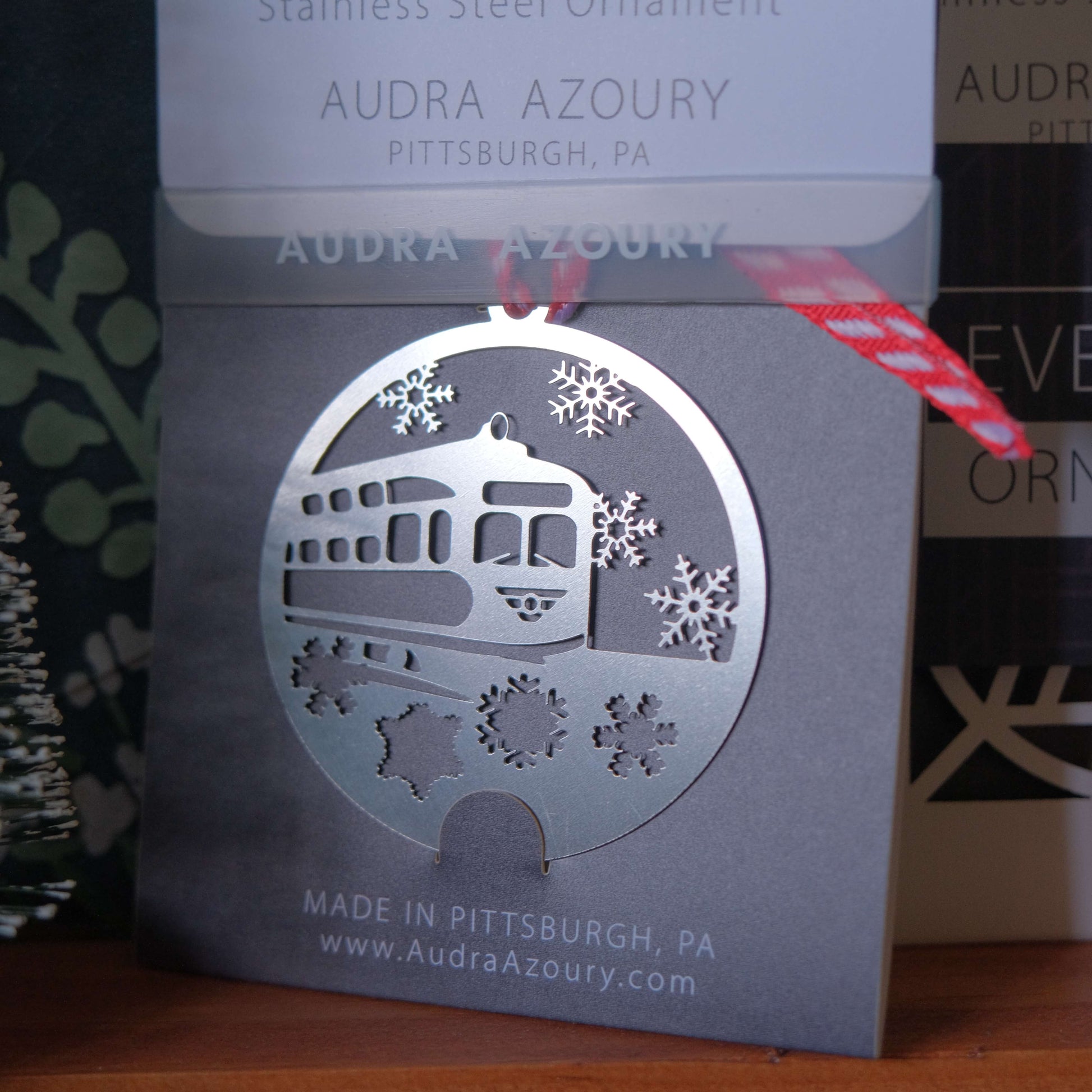 Trolley with Snowflakes Ornament by Audra Azoury