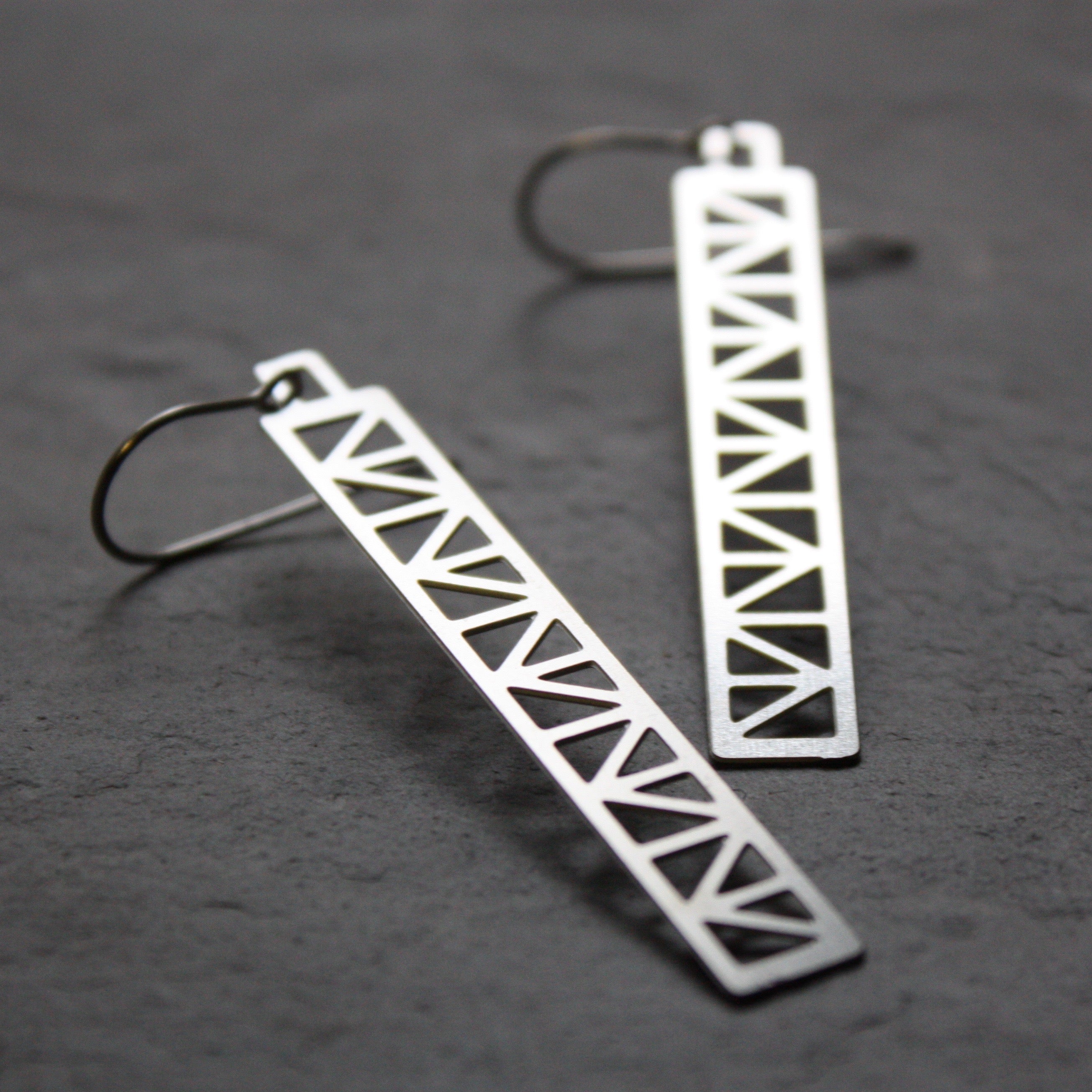 Peace Truss Earring design by Audra Azoury