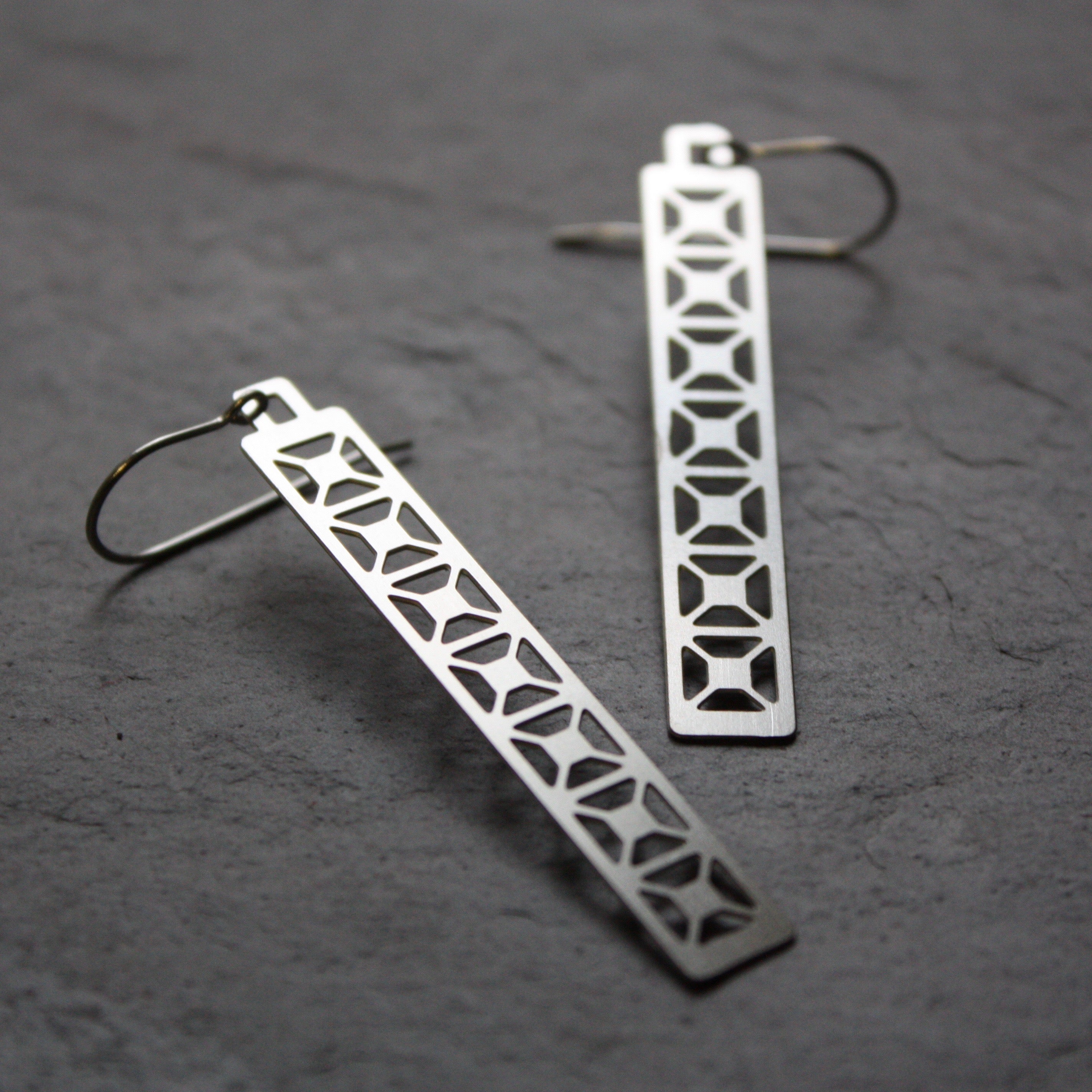 X Truss Dangle in silver by Audra Azoury