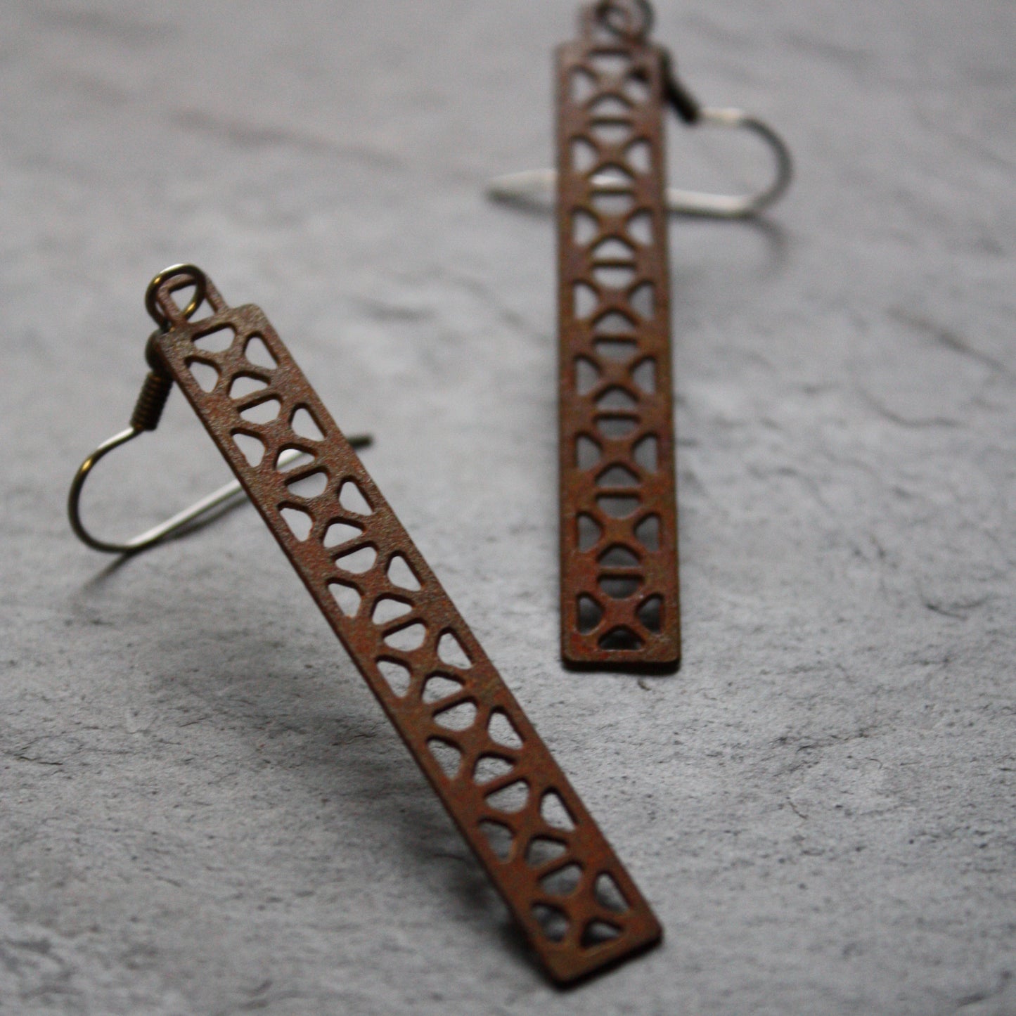 Bridge Earrings | X Truss Dangle in rust by Audra Azoury